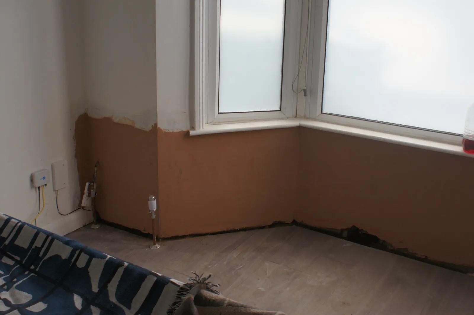 The same bay window treated and re-rendered, drying and ready for decoration