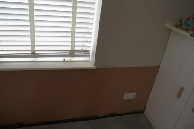 Bay window replastered after a new DPC
