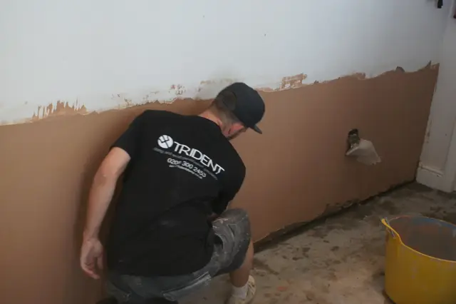 Brown coat on, skim to follow