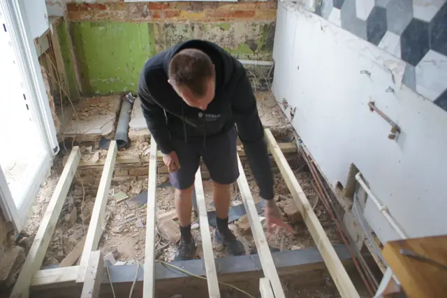 Old floor out so the source can be treated