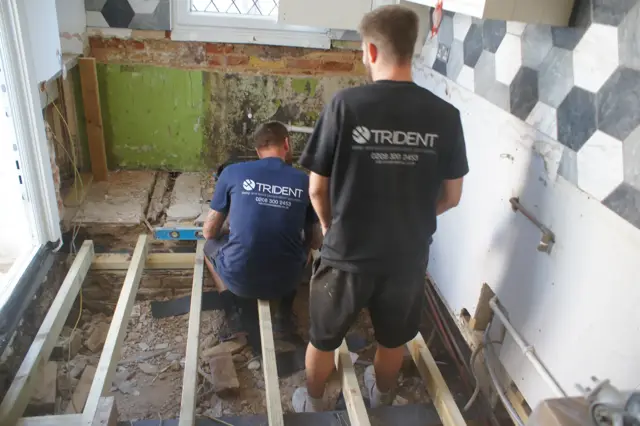 New treated joists levelled and fixed