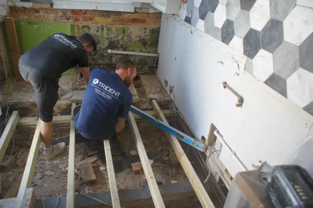 Floor structure rebuilt with treated timber