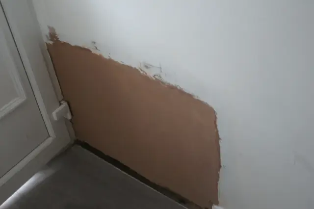 Patch repair blended into the original wall