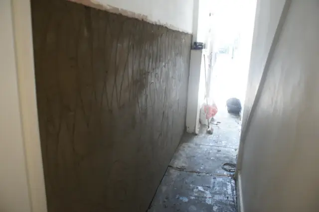 Passage walls rendered and drying