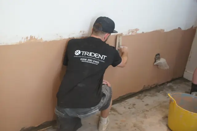 Salt-resistant render skimmed by hand