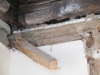 Leaks from bathroom above causing dry rot to penetrate timber joists and walls
