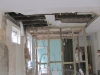 Leaks from bathroom above causing dry rot to penetrate timber joists and walls